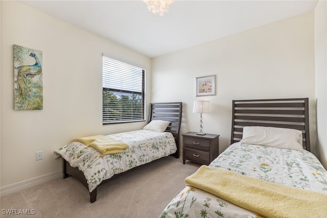 4360 Aurora St, Naples, FL 34119 - carpeted bedroom with baseboards