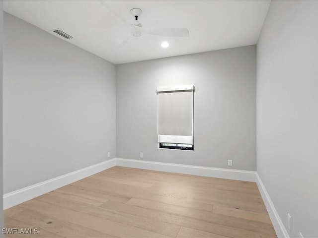 unfurnished room with baseboards, visible vents, recessed lighting, ceiling fan, and light wood-type flooring