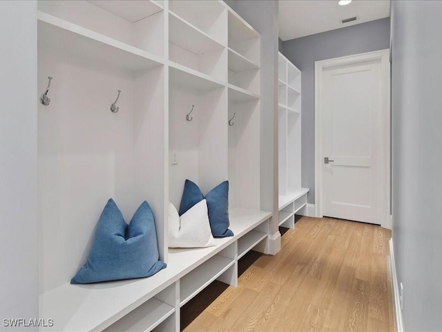 mudroom featuring visible vents and light wood-type flooring