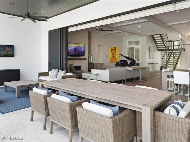 dining space featuring recessed lighting, stairs, and a ceiling fan