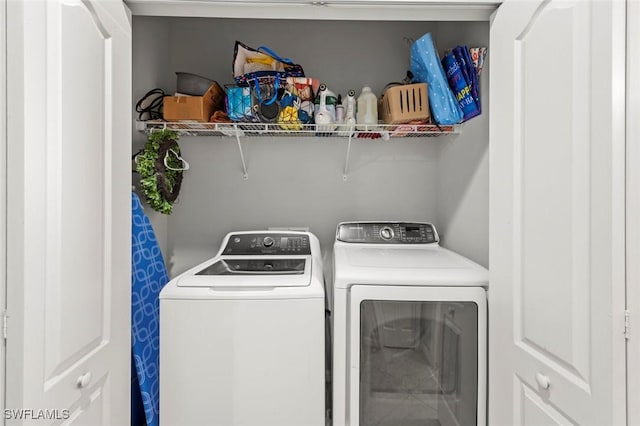 laundry room with laundry area and independent washer and dryer