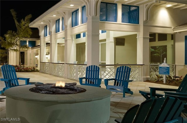 view of patio featuring a fire pit