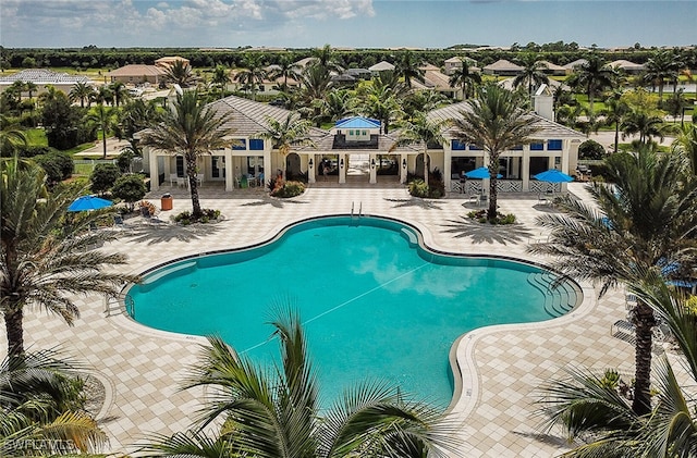 pool with a patio