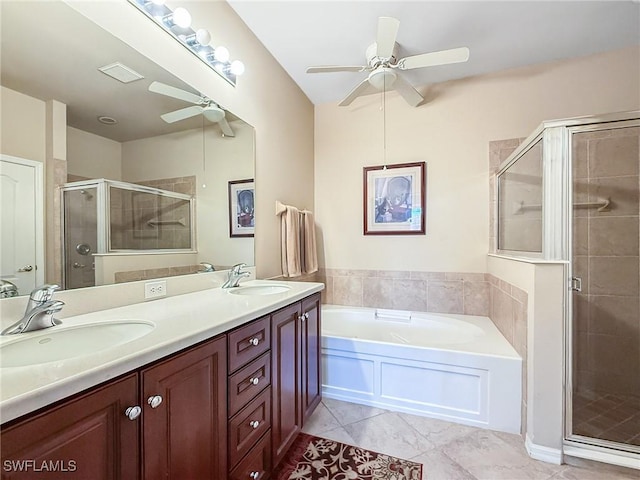 full bathroom with a sink, a garden tub, a stall shower, and a ceiling fan