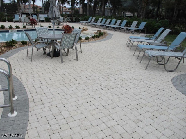 view of patio / terrace featuring a community pool