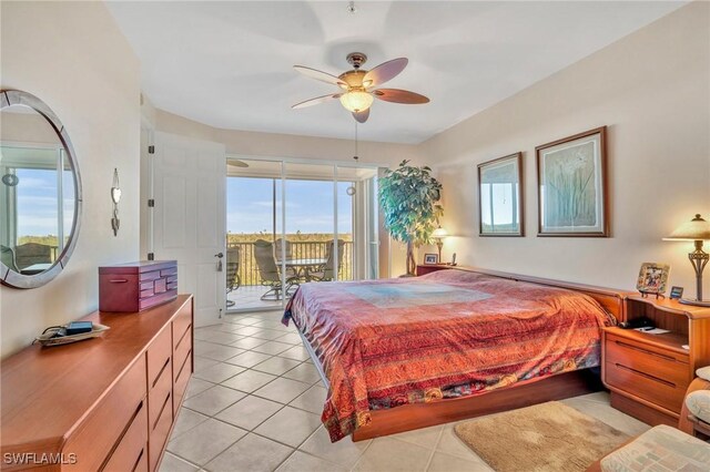 bedroom featuring light tile patterned floors, ceiling fan, and access to outside