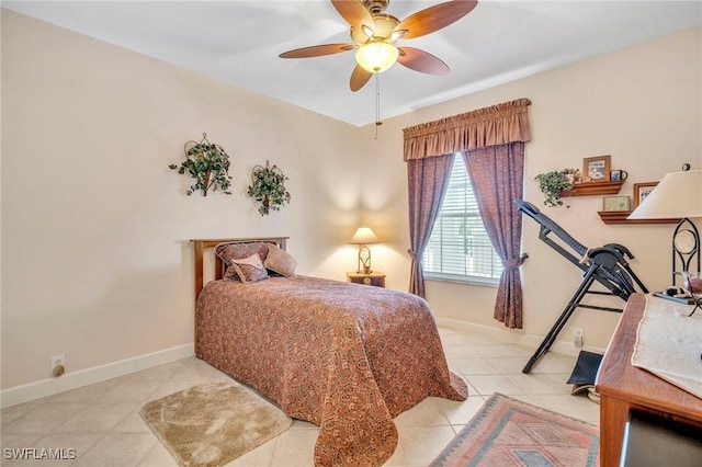 bedroom featuring tile patterned floors, baseboards, and ceiling fan