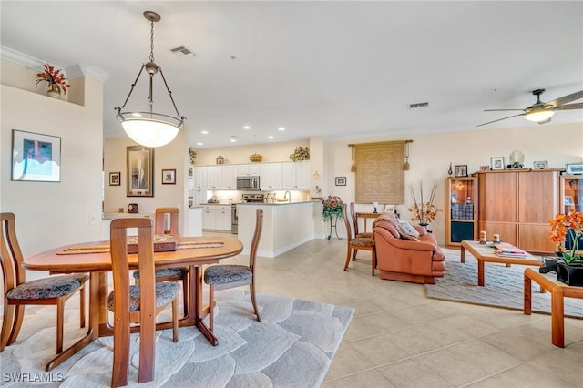 dining space featuring light tile patterned floors, visible vents, recessed lighting, and crown molding