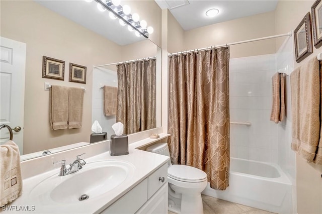 bathroom featuring tile patterned floors, toilet, vanity, and shower / tub combo