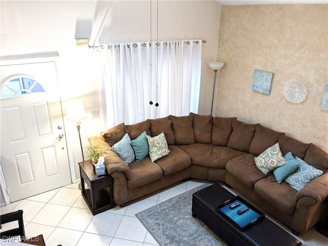 living room with light tile patterned floors