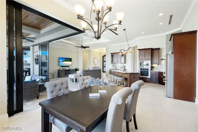 dining area with visible vents, ornamental molding, ceiling fan with notable chandelier, recessed lighting, and light tile patterned floors