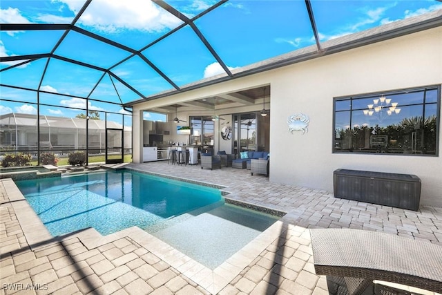 view of swimming pool featuring outdoor lounge area, glass enclosure, and a patio area