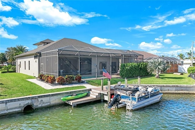 dock area featuring glass enclosure, a yard, and a water view