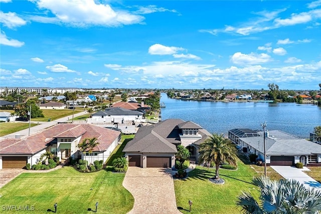 aerial view featuring a residential view and a water view