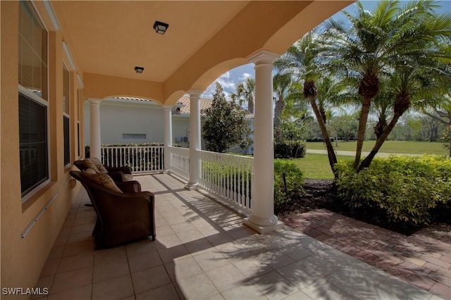 view of patio featuring a porch