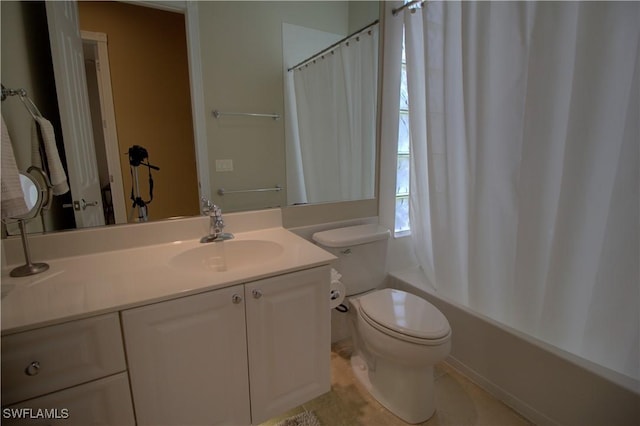 bathroom with shower / bath combo with shower curtain, toilet, and vanity