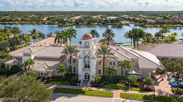 birds eye view of property featuring a water view