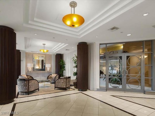 building lobby featuring visible vents