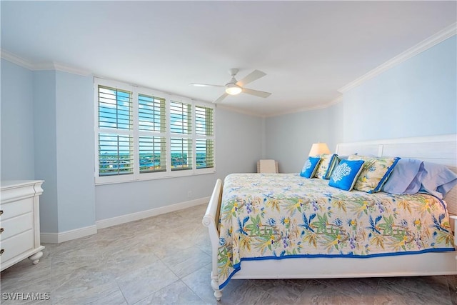 bedroom featuring a ceiling fan, baseboards, and ornamental molding