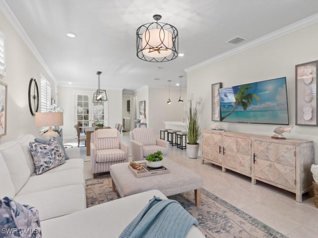 living area with recessed lighting, visible vents, a notable chandelier, and crown molding