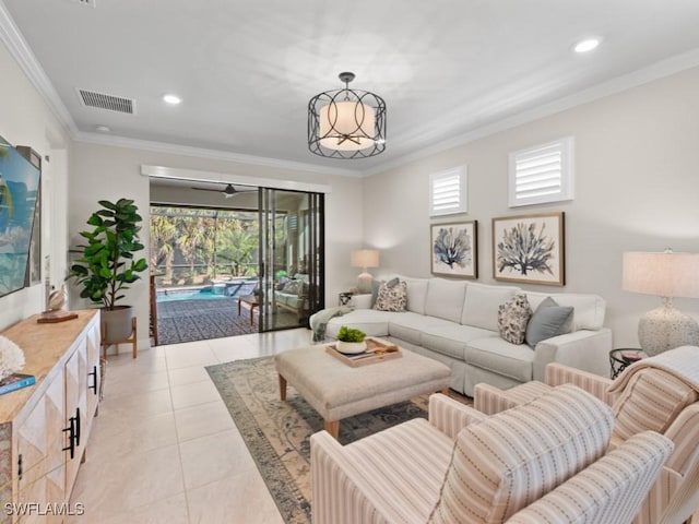 living area featuring light tile patterned flooring, visible vents, recessed lighting, and crown molding