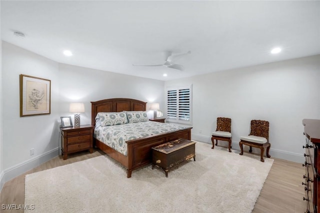 bedroom featuring recessed lighting, baseboards, and light wood-type flooring