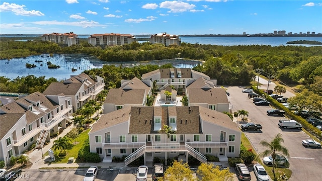 drone / aerial view featuring a water view