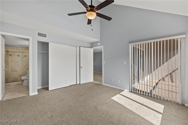 unfurnished bedroom with baseboards, visible vents, ensuite bath, and carpet