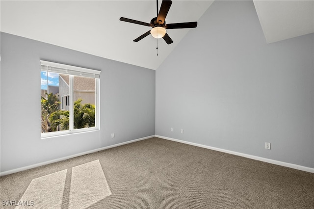 carpeted spare room featuring a ceiling fan, baseboards, and high vaulted ceiling