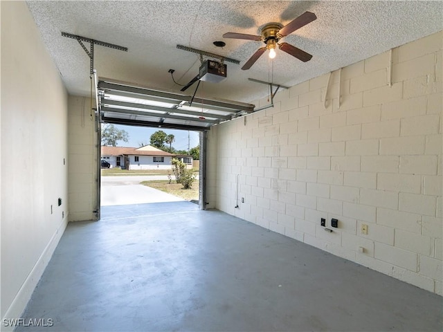 garage featuring concrete block wall