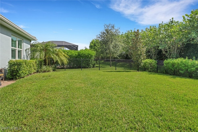 view of yard featuring fence