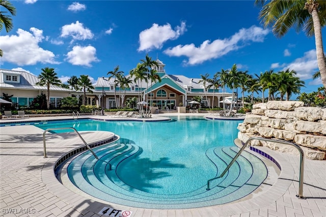 community pool with a patio