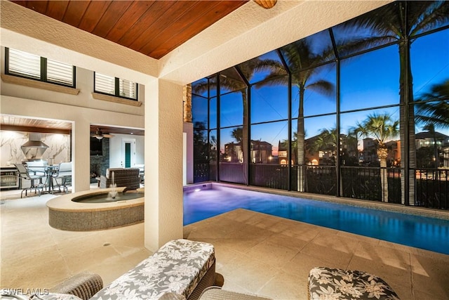 view of pool with a fenced in pool, ceiling fan, glass enclosure, a patio area, and outdoor dining space