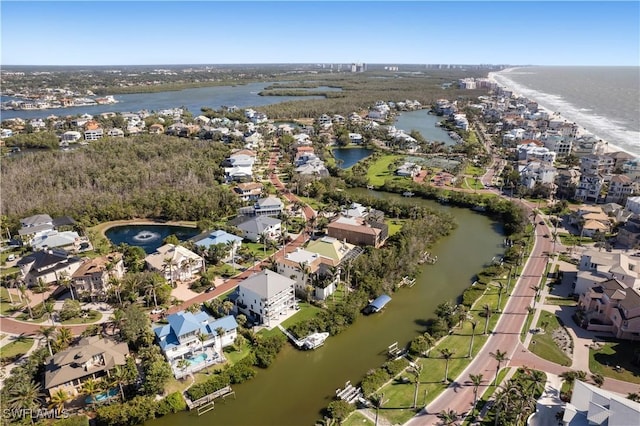 aerial view featuring a residential view and a water view