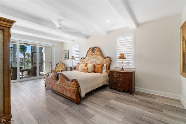 bedroom with access to exterior, multiple windows, light wood-type flooring, and baseboards