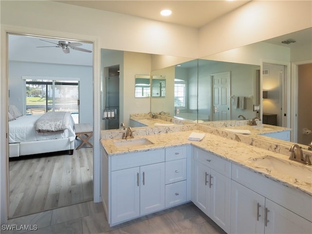 full bath featuring a sink, visible vents, ensuite bath, and ceiling fan