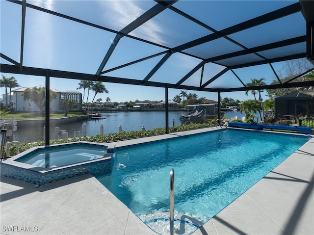 view of pool featuring a lanai, a pool with connected hot tub, a patio, and a water view