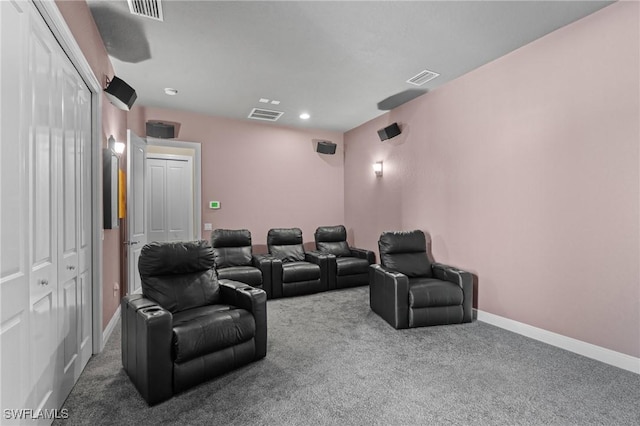 home theater with visible vents, baseboards, and carpet flooring