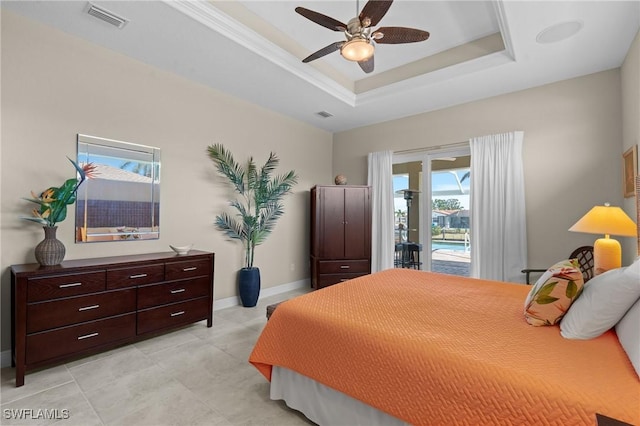 bedroom featuring visible vents, ceiling fan, baseboards, a raised ceiling, and access to outside