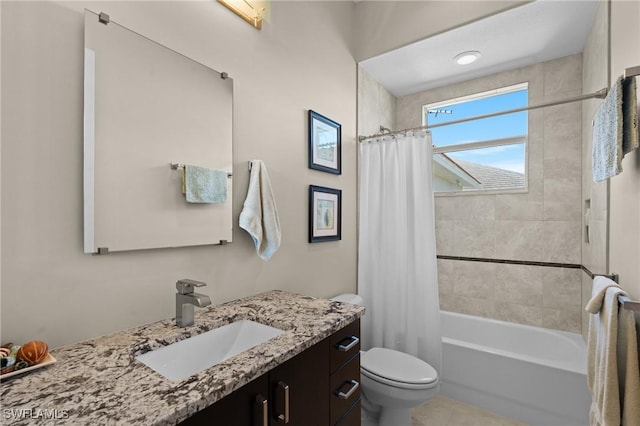 bathroom with shower / tub combo with curtain, toilet, and vanity