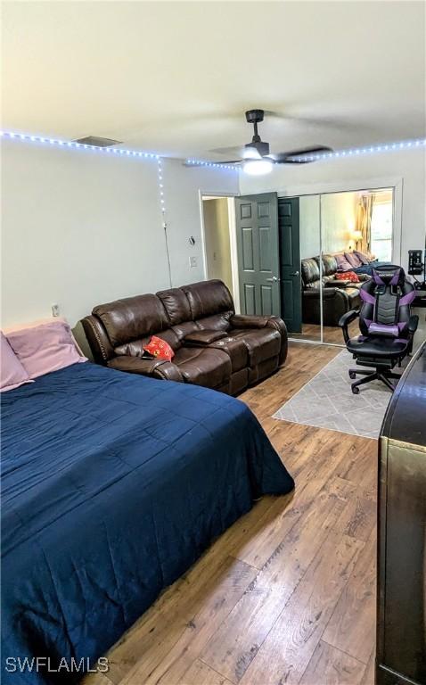 bedroom with wood finished floors