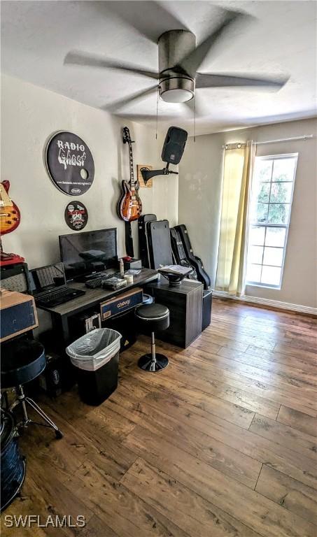 office area featuring hardwood / wood-style floors and ceiling fan