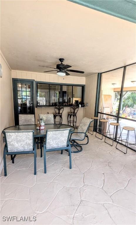 view of patio featuring a ceiling fan