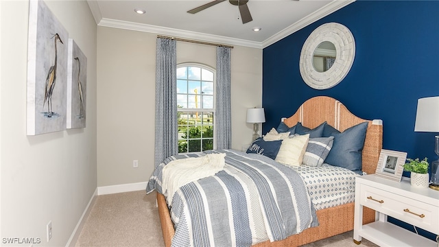 carpeted bedroom with ceiling fan, recessed lighting, baseboards, and ornamental molding