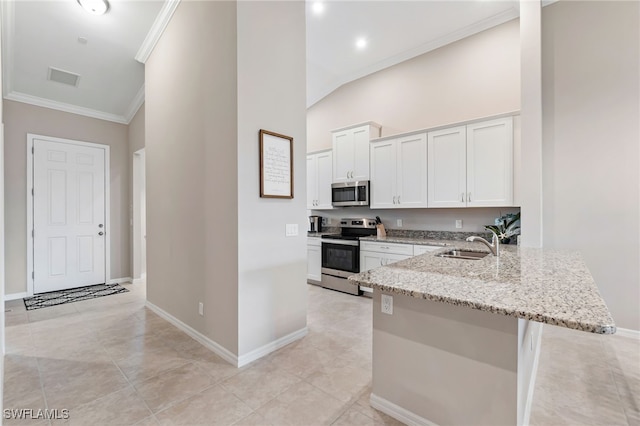 kitchen with ornamental molding, a sink, light stone counters, appliances with stainless steel finishes, and white cabinets