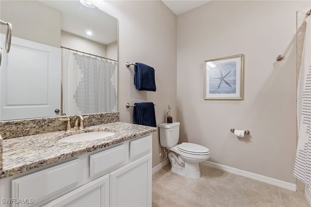 full bath featuring tile patterned floors, toilet, vanity, and baseboards