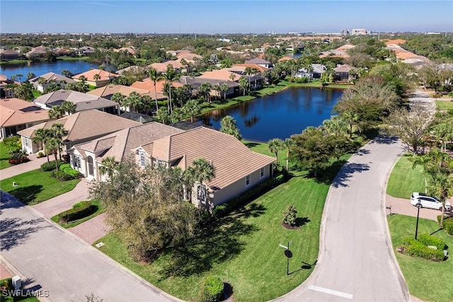 aerial view featuring a residential view and a water view