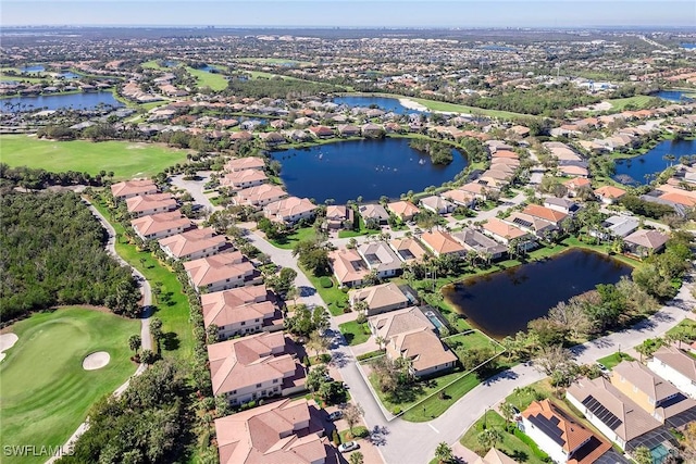 bird's eye view with a residential view, golf course view, and a water view