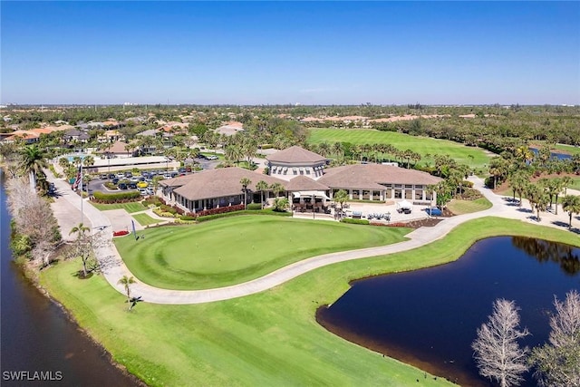 bird's eye view featuring golf course view and a water view