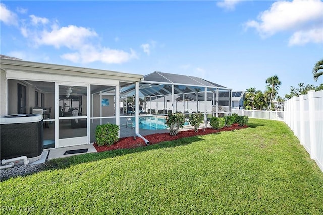 view of yard with a lanai, a fenced in pool, cooling unit, and a fenced backyard